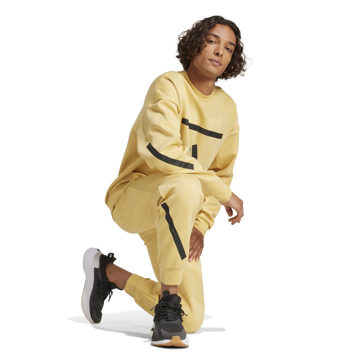 product/a/d/adidas_jj4896_6_apparel_on_model_walking_view_white.jpg