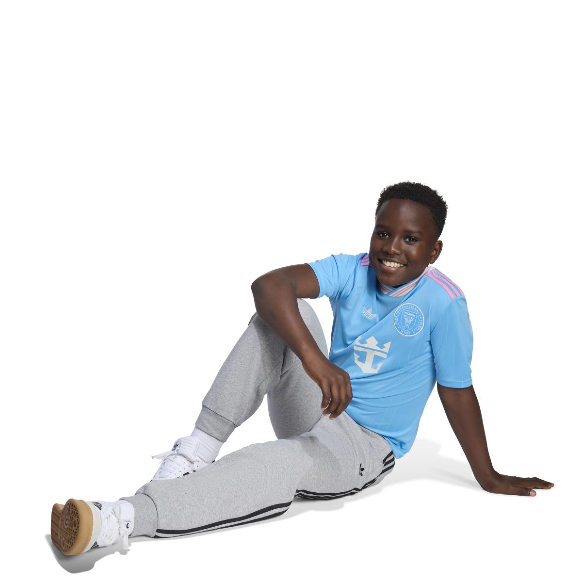 product/a/d/adidas_ka7507_5_apparel_on_model_walking_view_white.jpg
