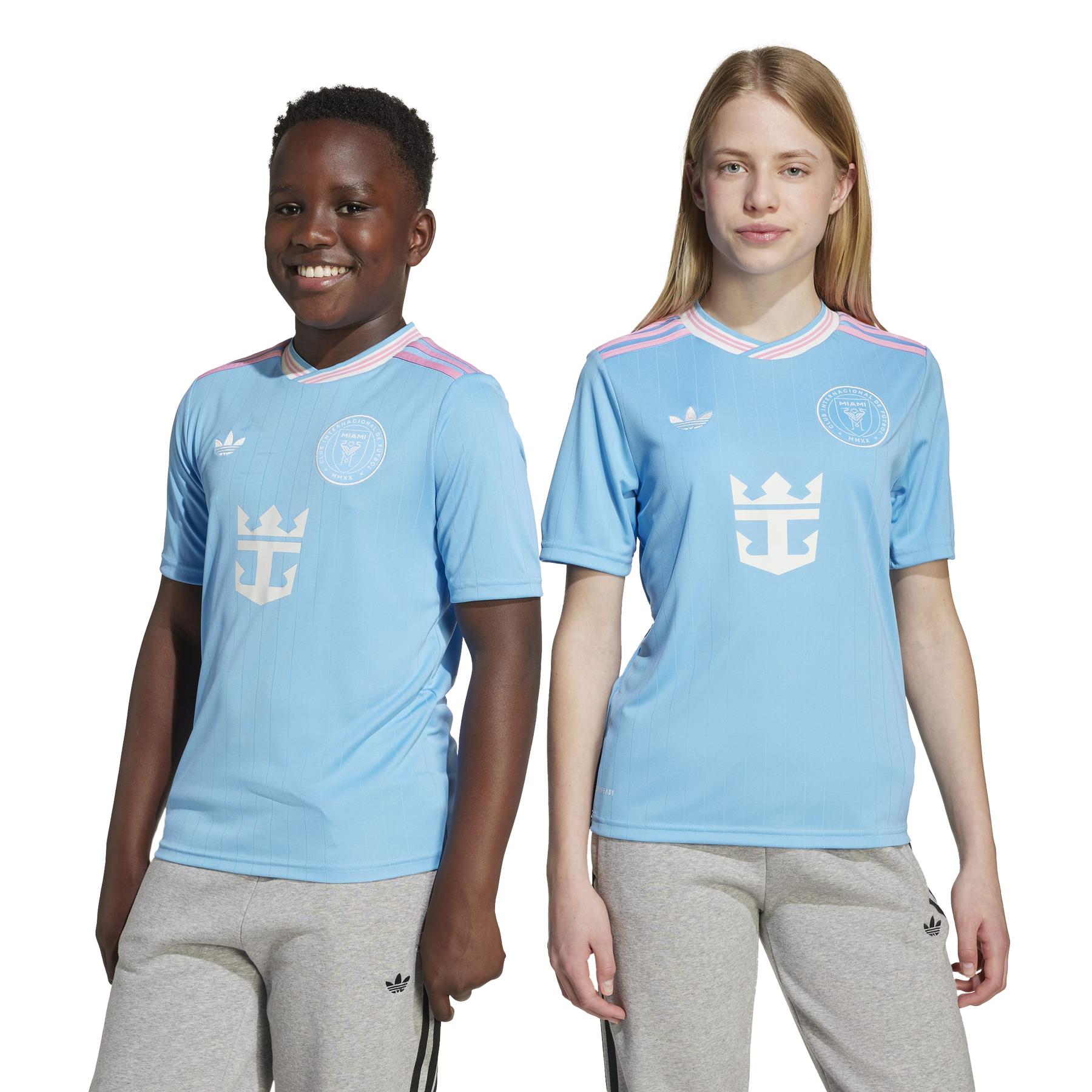 product/a/d/adidas_ka7507_9_apparel_on_model_standard_unisex_pair_shot_white.jpg